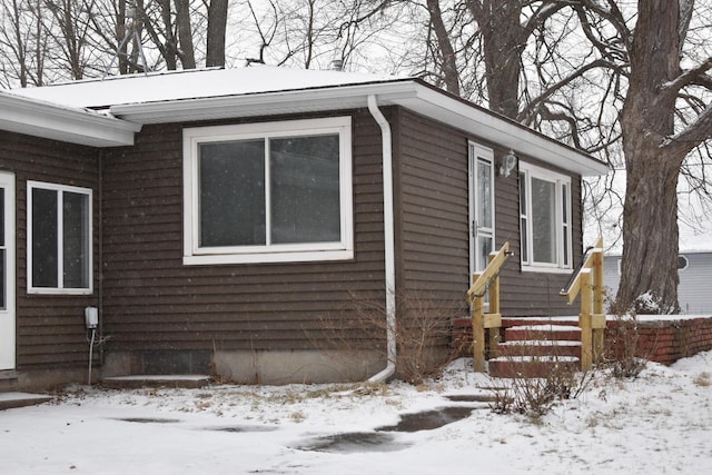 view of snow covered property