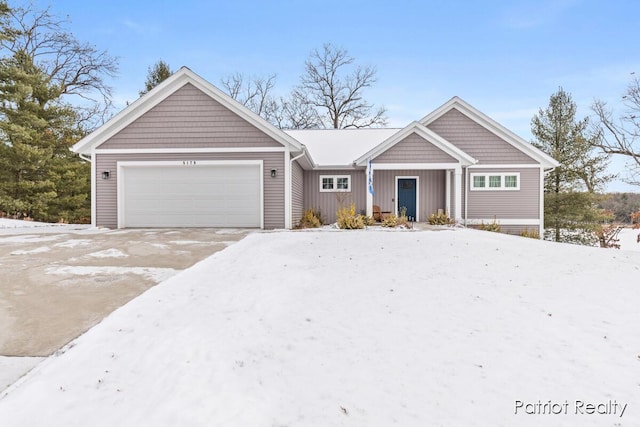 view of front of property featuring a garage