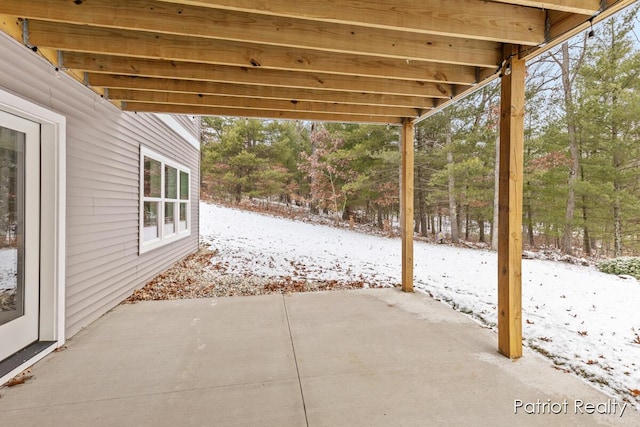 view of snow covered patio