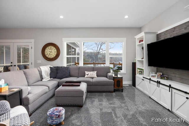 living room with dark carpet and french doors