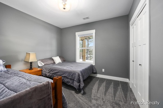 carpeted bedroom with a closet