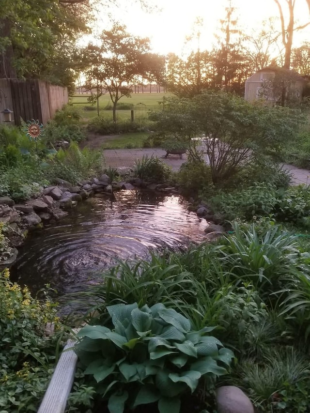 view of yard at dusk