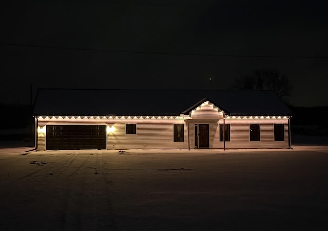 view of front of home with a garage