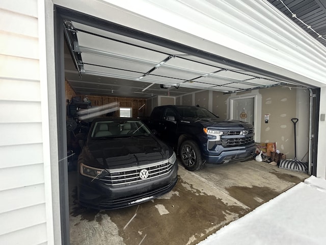 garage featuring a garage door opener