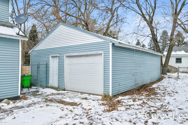 view of snow covered garage