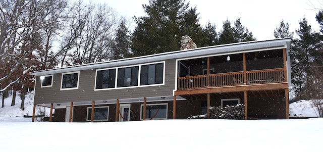 view of snow covered property