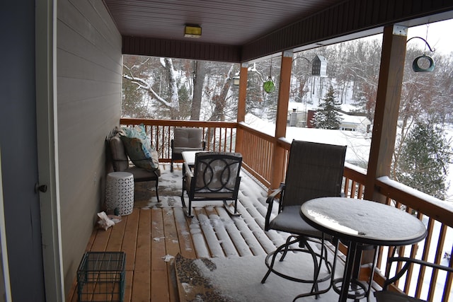 view of snow covered deck