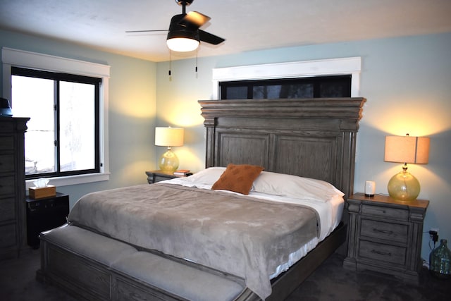 carpeted bedroom featuring ceiling fan