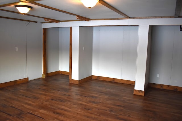 basement featuring dark wood-type flooring