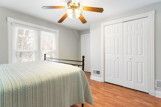 bedroom featuring ceiling fan and wood-type flooring