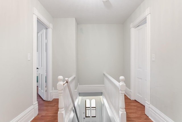 hallway featuring hardwood / wood-style floors