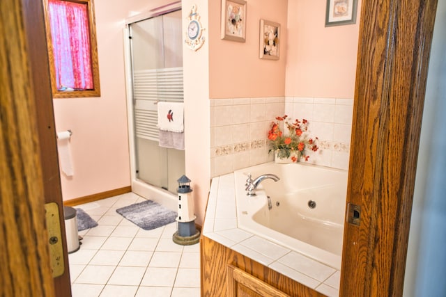 bathroom with tile patterned flooring and plus walk in shower