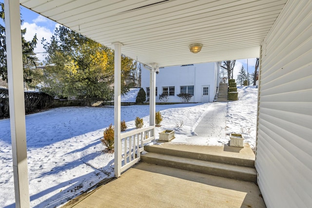 view of snow covered patio