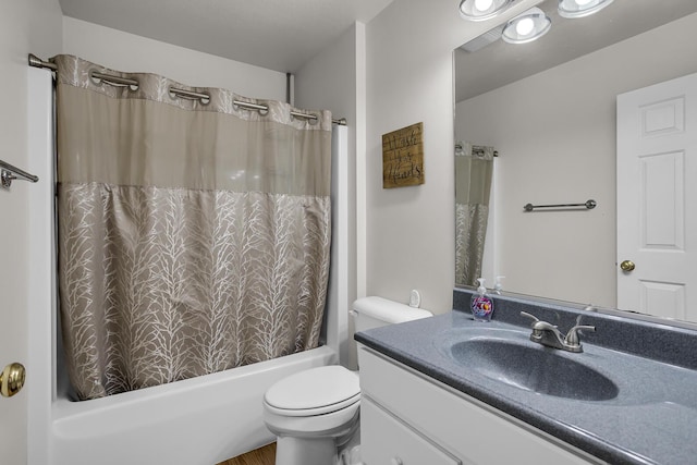 full bathroom featuring toilet, vanity, and shower / bath combo