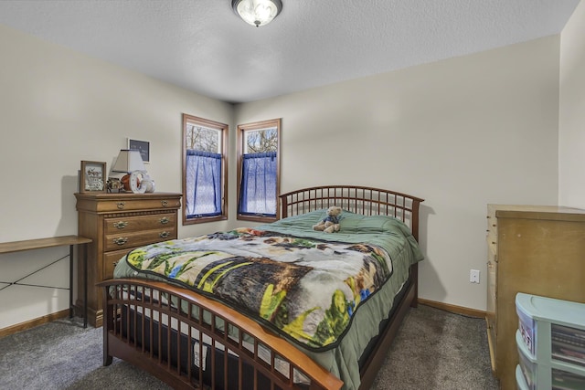 carpeted bedroom with a textured ceiling