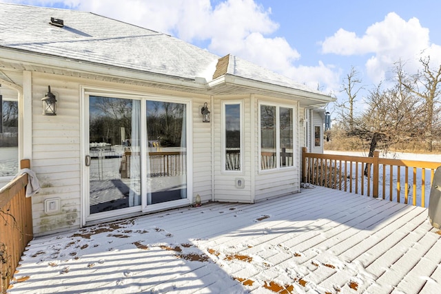 view of snow covered deck