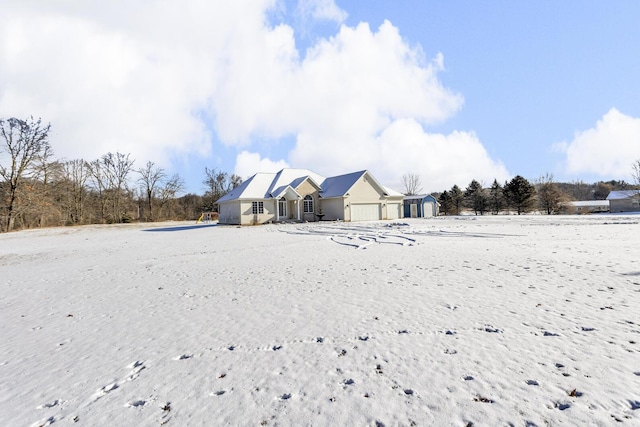 view of snow covered house