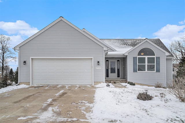 ranch-style home with a garage