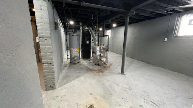 basement featuring gas water heater