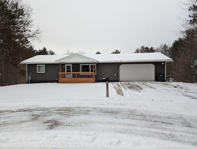 single story home with a garage