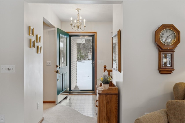 entryway with an inviting chandelier