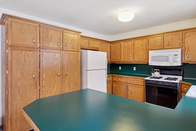 kitchen featuring white appliances