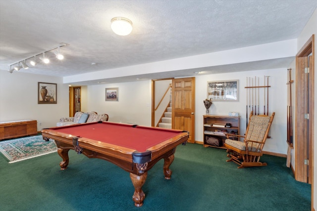 rec room with carpet flooring, a textured ceiling, track lighting, and billiards