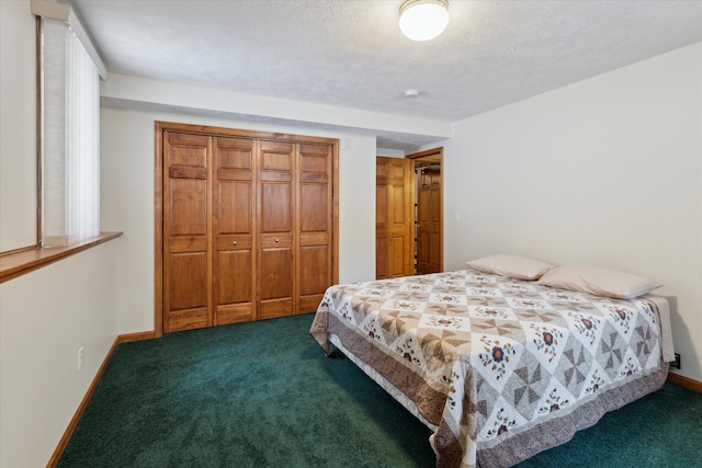 carpeted bedroom with a textured ceiling