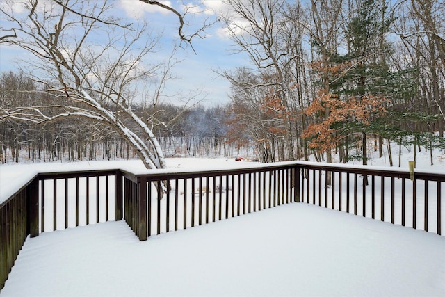 view of snow covered deck