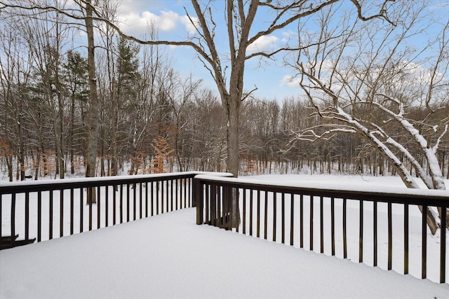 view of snow covered deck