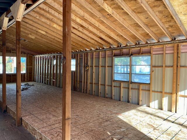 miscellaneous room with vaulted ceiling