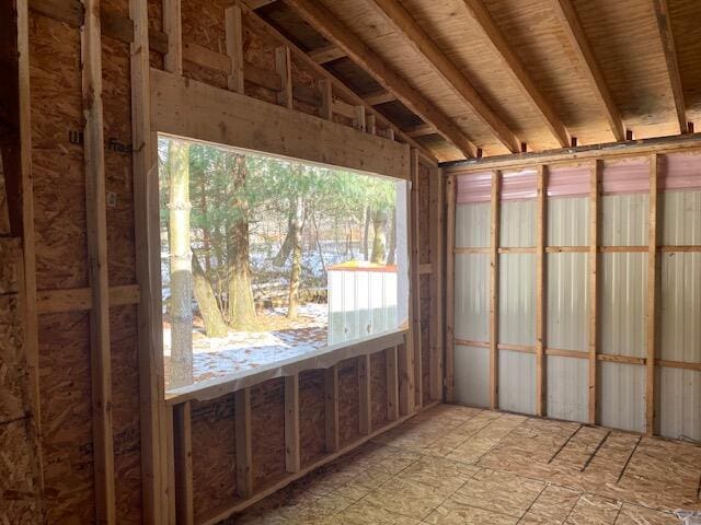 interior space with lofted ceiling and plenty of natural light