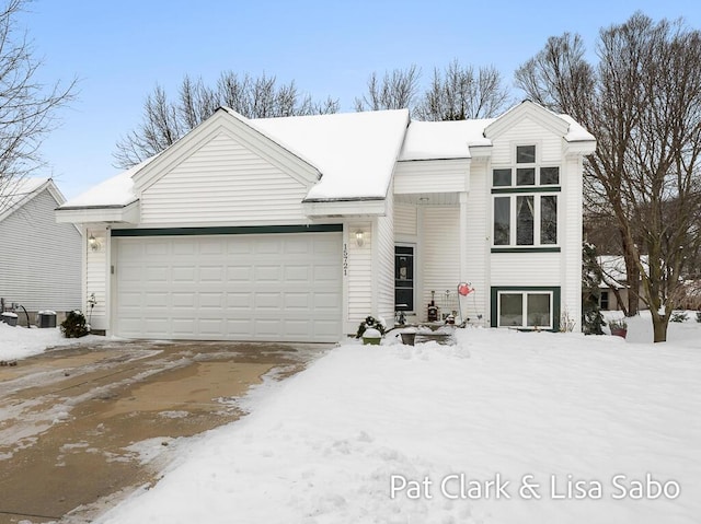 view of front of home with a garage