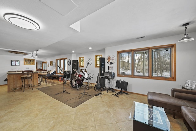 exercise area with ceiling fan