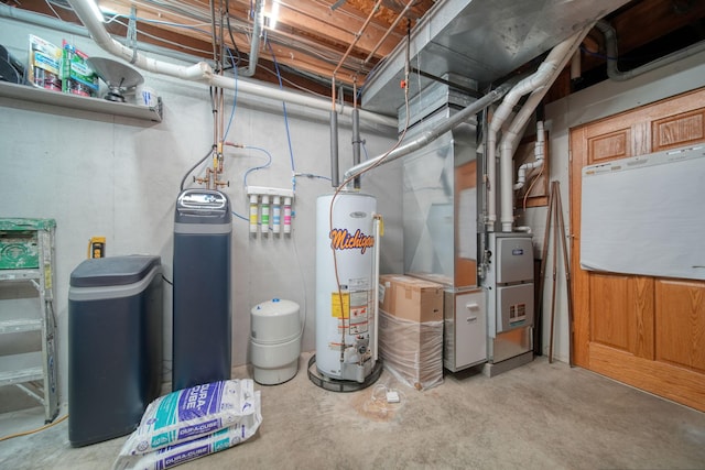 utility room featuring heating unit and gas water heater