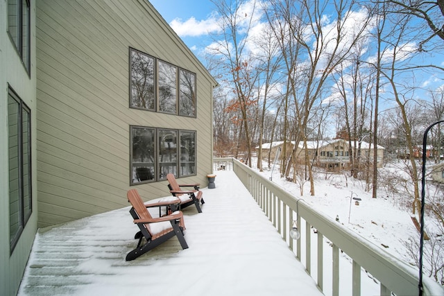 view of snow covered deck