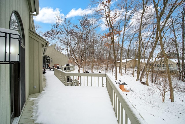 view of snow covered deck