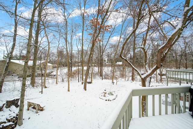 view of snow covered deck