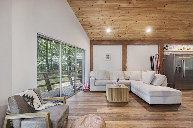 living room with hardwood / wood-style flooring, high vaulted ceiling, and wooden ceiling