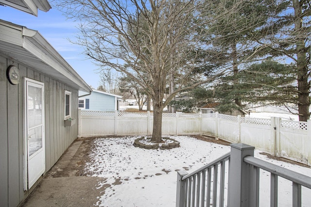 view of yard covered in snow