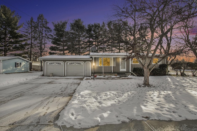 view of front of property featuring a garage