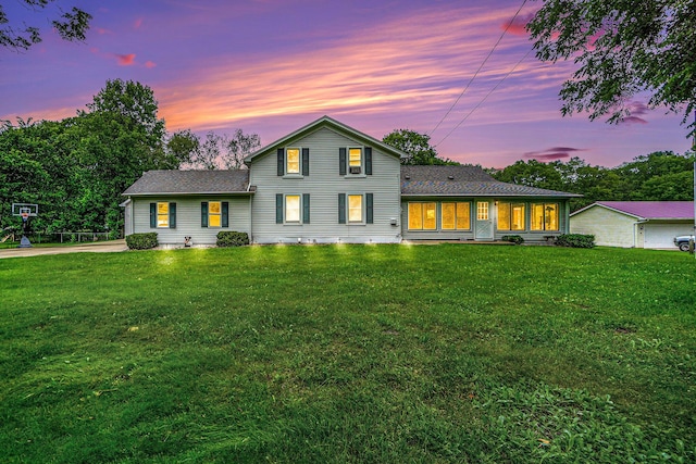 view of front of property with a lawn