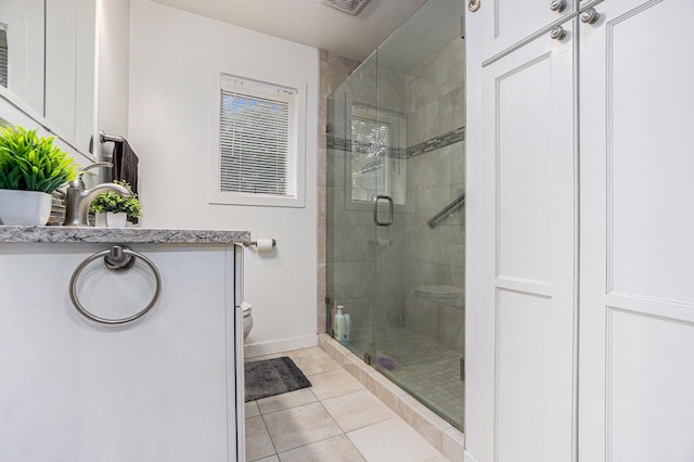 bathroom with tile patterned flooring, an enclosed shower, and toilet