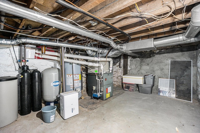 basement with gas water heater and heating unit