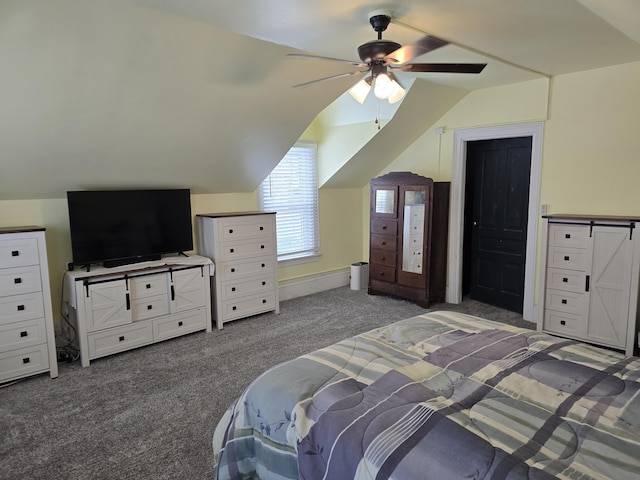 carpeted bedroom featuring ceiling fan and lofted ceiling