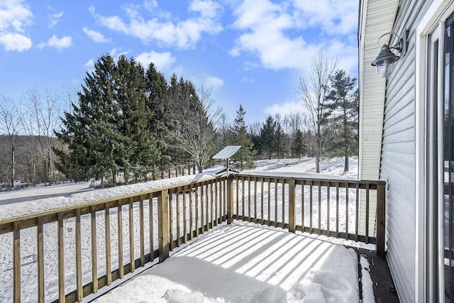 view of snow covered deck