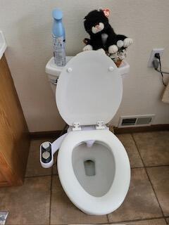 bathroom featuring tile patterned flooring and toilet