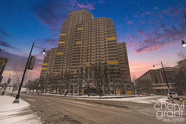 view of outdoor building at dusk