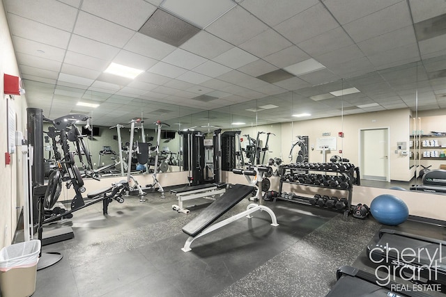 workout area featuring a drop ceiling