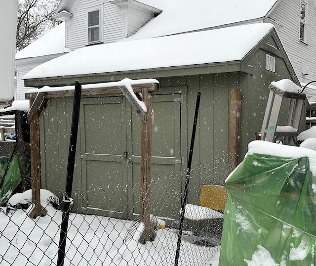 exterior space with a storage shed